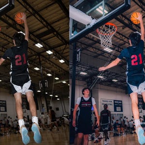 May include: A basketball player wearing a black and white jersey with the number 21 jumps to make a basket. The player is in mid-air with the ball in their hand. The player is in a gymnasium with other players and spectators in the background.