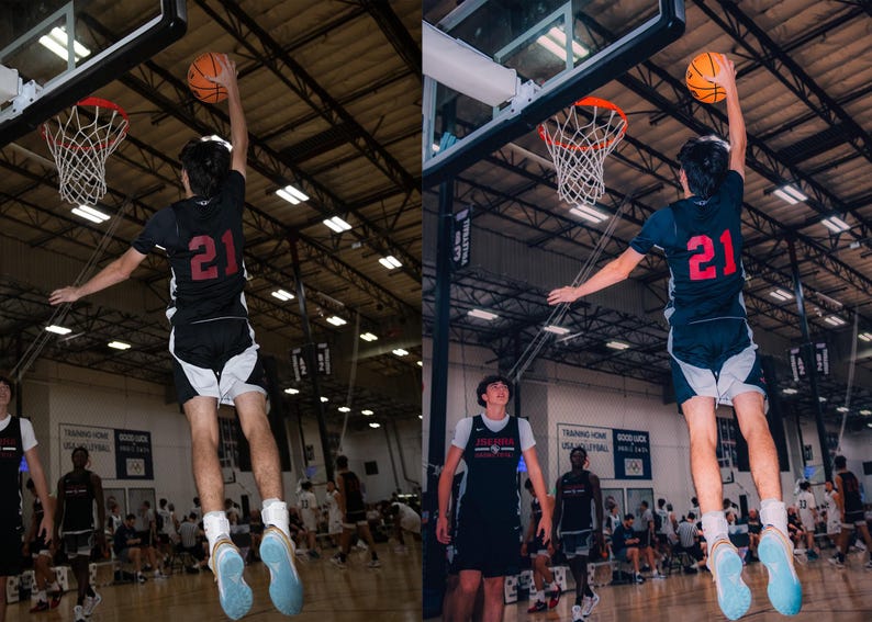 May include: A basketball player wearing a black and white jersey with the number 21 jumps to make a basket. The player is in mid-air with the ball in their hand. The player is in a gymnasium with other players and spectators in the background.
