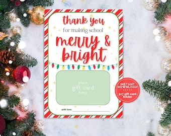 May include: Printable gift card holder with a red and white candy cane stripe border. The text reads "Thank you for making school merry & bright".  There is a space to place a gift card and a line for a signature.  The text "Instant Download 5x7 gift card holder" is also included.