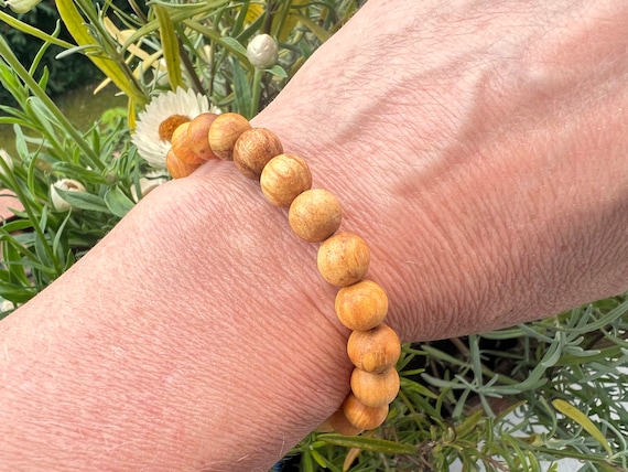 Pulsera Palo Santo 8 mm cosechada de manera sostenible - Etsy España