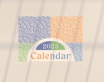 May include: A 2025 calendar with a colorful abstract design. The calendar has a blue, green, orange, and white pattern.