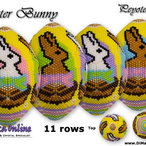 以下が含まれることがあります： ウサギのデザインが施されたビーズでできたイースターエッグ。卵は黄色で、茶色、白、ピンク、緑、紫のビーズが使われています。ウサギは白で、ピンクのリボンをしています。卵は11列の高さです。画像の上部には「Easter Bunny」と「Lepote Egg」の文字があります。画像の下部には「DiMarca Online」の文字があります。