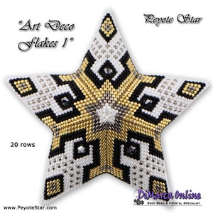 May include: A beaded star with a geometric design in white, black, and gold. The star is labeled "Art Deco Flakes 1" and "Peyote Star". It has 20 rows of beads and is from DiMarca Online, a seed bead and crystal specialist.