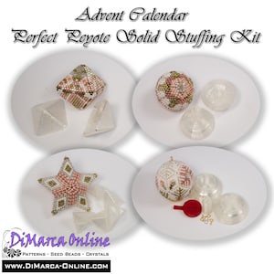 May include: Advent Calendar Perfect Peyote Solid Stuffing Kit. Four white plates with pink and gold beaded ornaments, clear plastic domes, and a red beading needle. The kit includes a star, a cube, and two round ornaments.