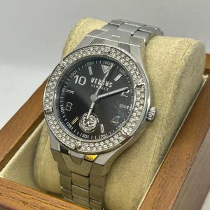 Ladies Versace Versus silver watch with diamanté bezel and black dial