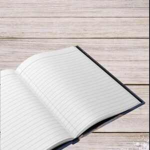 May include: An open notebook with white lined pages. The notebook has a dark blue cover that is visible along the edges. The pages are blank with thin horizontal black lines, providing a clean space for writing or note-taking on each sheet.