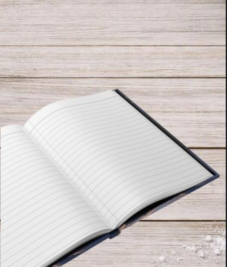 May include: An open notebook with white lined pages. The notebook has a dark blue cover that is visible along the edges. The pages are blank with thin horizontal black lines, providing a clean space for writing or note-taking on each sheet.