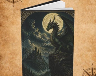 May include: A hardcover book featuring a dark, detailed illustration on the front cover. The artwork depicts a large, green, winged dragon perched on a rocky cliff overlooking a castle under a full moon and cloudy night sky.
