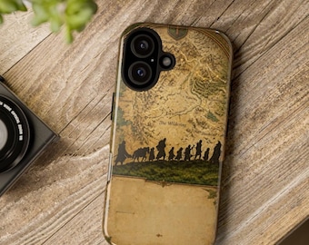 May include: A smartphone case featuring a tan, parchment-style map background with the text The Wildering. A black silhouette of a group of travelers walking across a green landscape is printed across the center of the map design.