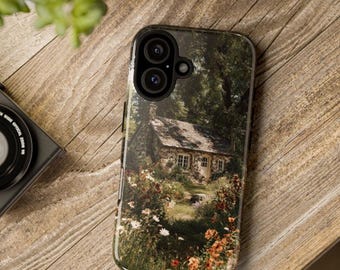 May include: A rectangular smartphone case featuring a printed image of a stone cottage nestled in a lush garden with colorful flowers, green trees, and a dark roof, with a black camera lens cutout positioned at the top left corner.