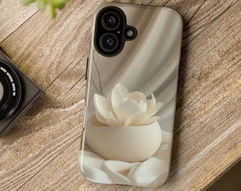 May include: A smartphone case featuring a beige and cream-colored design with a central graphic of a white lotus flower in a rounded bowl, set against a background of soft, flowing fabric folds and a thin, dark, branch-like line.