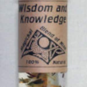 May include: A glass bottle with a black lid filled with a clear liquid and dried herbs. The label reads "Wisdom and Knowledge Blend of Herbs 100% Natural".