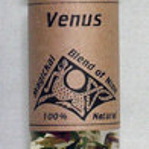 May include: A small glass bottle with a black lid filled with dried herbs and flowers. The label reads "Venus Blend of Herbs Magical Nature 120 ml".