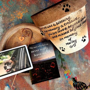 Hand-painted personalized pet memorial planter with custom wording and colors. Terracotta sympathy pot with pet name for dog or cat loss, Rainbow Bridge tribute.  Shown in bronze gradient.