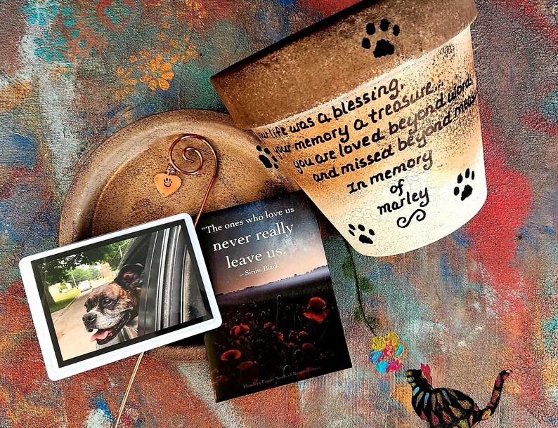 Hand-painted personalized pet memorial planter with custom wording and colors. Terracotta sympathy pot with pet name for dog or cat loss, Rainbow Bridge tribute.  Shown in bronze gradient.