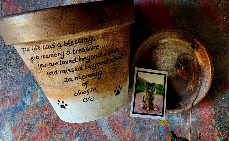 Personalized pet memorial planter with custom name and message.  Shown in bronze gradient.