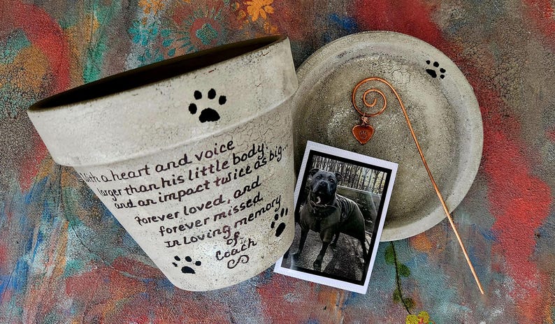 Pet loss memorial garden planter with personalized wording and pets name.  Shown in Sand.