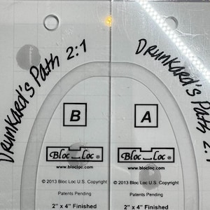 May include: A set of three ceramic mugs with a speckled, matte finish. The mugs are in shades of cream, light gray, and dark gray. Each mug has a simple, minimalist design, perfect for coffee or tea.