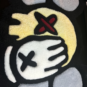 KAWS covering EYE
