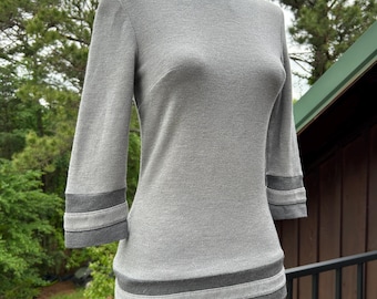 Túnica vintage de punto de lana gris estilo era espacial de los años 60