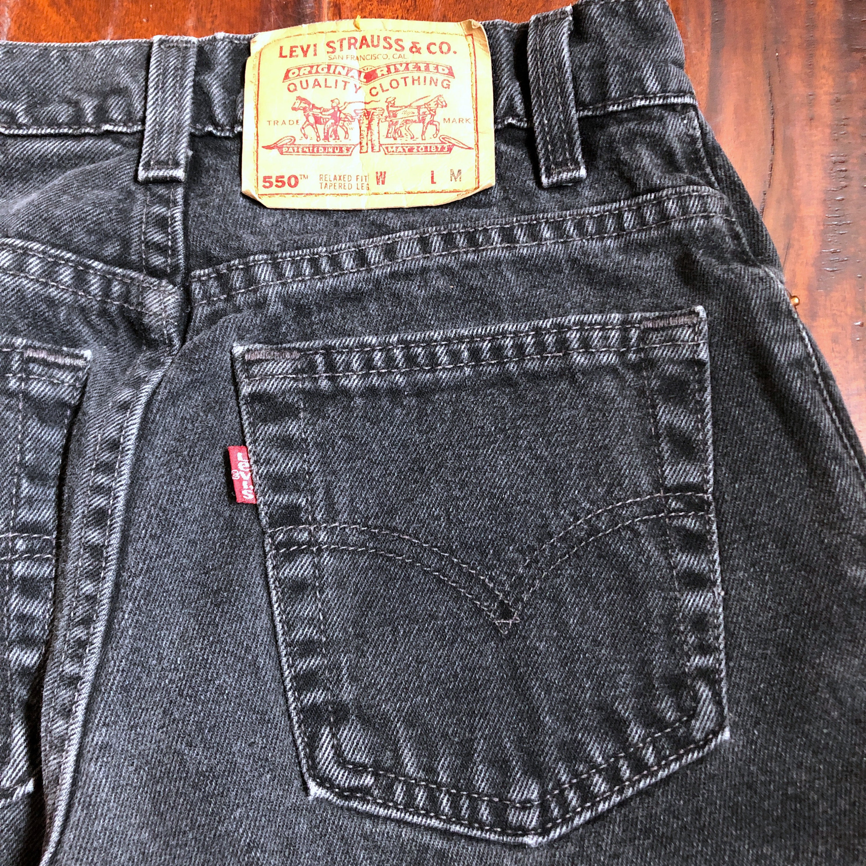 Vintage 90s Levi's 550 Black Denim High Rise Tapered Jeans Made in