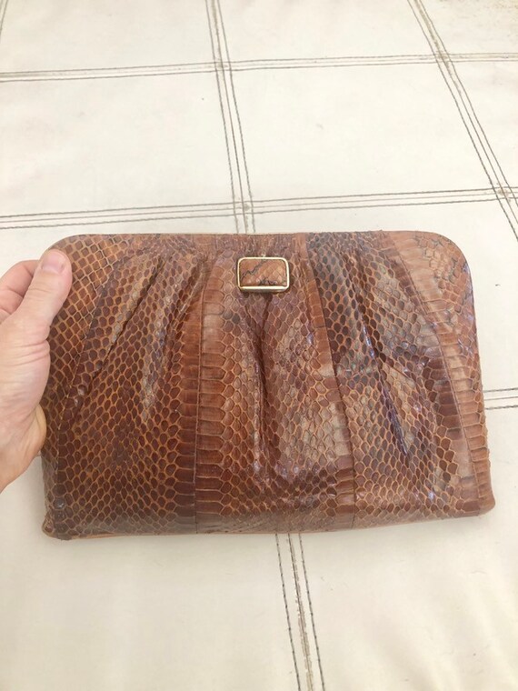 Brown vintage snake skin clutch