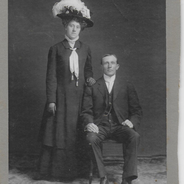 Edwardian Photograph, Lady, Dark Dress, White Feathers in hat, Gentleman Sitting, Mounted on Card