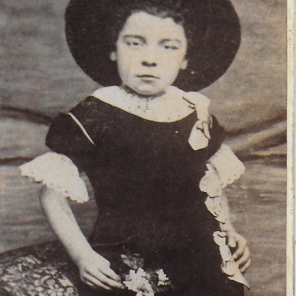 Victorian CDV Young Victorian Child, Dark Dress, Black Hat, lace Trims, Flowers in Hand, Whitehouse, Manchester