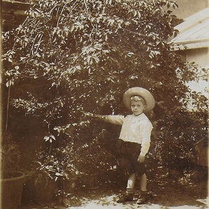 Real Photo, Edwardian Photograph,Young Boy, Summer Hat, Big Bush, Garden