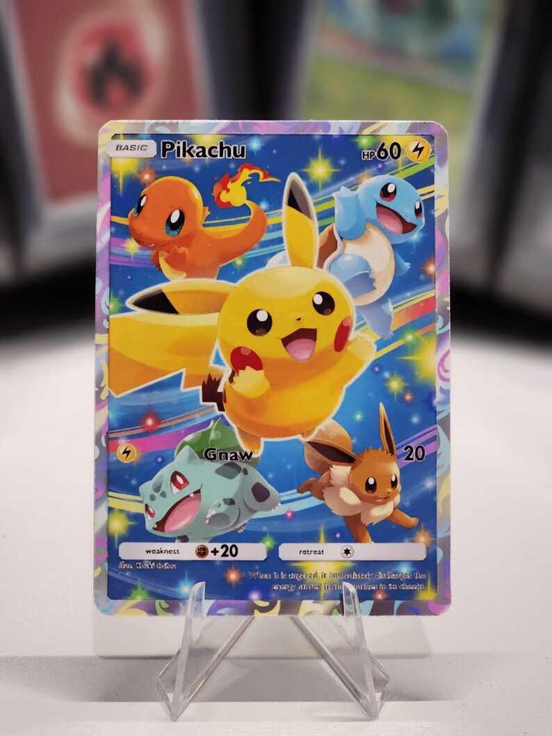 May include: A Pokemon trading card featuring Pikachu, a yellow electric mouse Pokemon, with other Pokemon including Bulbasaur, Charmander, and Squirtle. The card has a blue background with stars and rainbow streaks. The card text reads "BASIC Pikachu HP60 4 Gnaw 20 weakness +20 retreat When this Pokemon is knocked out, discard the top card of your deck.  "