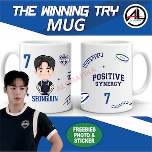 May include: White ceramic mug with the text "THE WINNING TRY MUG" in blue. One side features a cartoon character and the name "SEONGJUN". The other side has "RUGBY TEAM" and "POSITIVE SYNERGY". Includes the number 7 and a rugby ball graphic.
