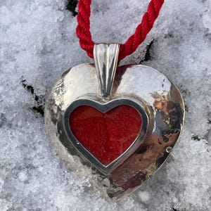 Heart pendant made of silver with red foam coral, traditional jewelry