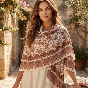 May include: A set of three ceramic mugs with a speckled, matte finish in cream, light grey, and dark grey. Each mug has a simple, minimalist design, suitable for coffee or tea.