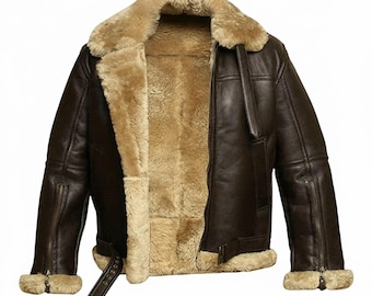 May include: A brown leather jacket with a tan shearling lining and collar. The jacket features a zip-up front, zippered sleeves, and a buckled belt at the waist. The jacket is designed for warmth and protection.