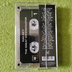 May include: A clear cassette tape case containing a black cassette tape with the album title "The Great Impersonator" by Halsey. The cassette label includes a tracklist and the Columbia Records logo.