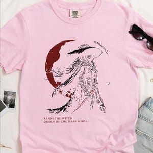Pink Comfort Colors Elden Ring t-shirt with Ranni the Witch Queen of the Dark Moon design, anime Soulslike gamer fan gift