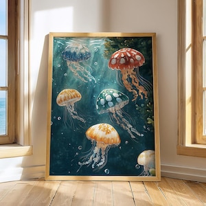 May include: A rectangular framed wall art print featuring a deep teal underwater scene with five jellyfish in shades of blue, red, green, and orange, each with long trailing tentacles and white spots, floating amidst small bubbles and dark seaweed.