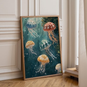May include: A rectangular framed wall art print featuring a deep teal underwater scene with six jellyfish in various colours including red, orange, blue, and green. Each jellyfish has a translucent bell with white spots and long, flowing tentacles.