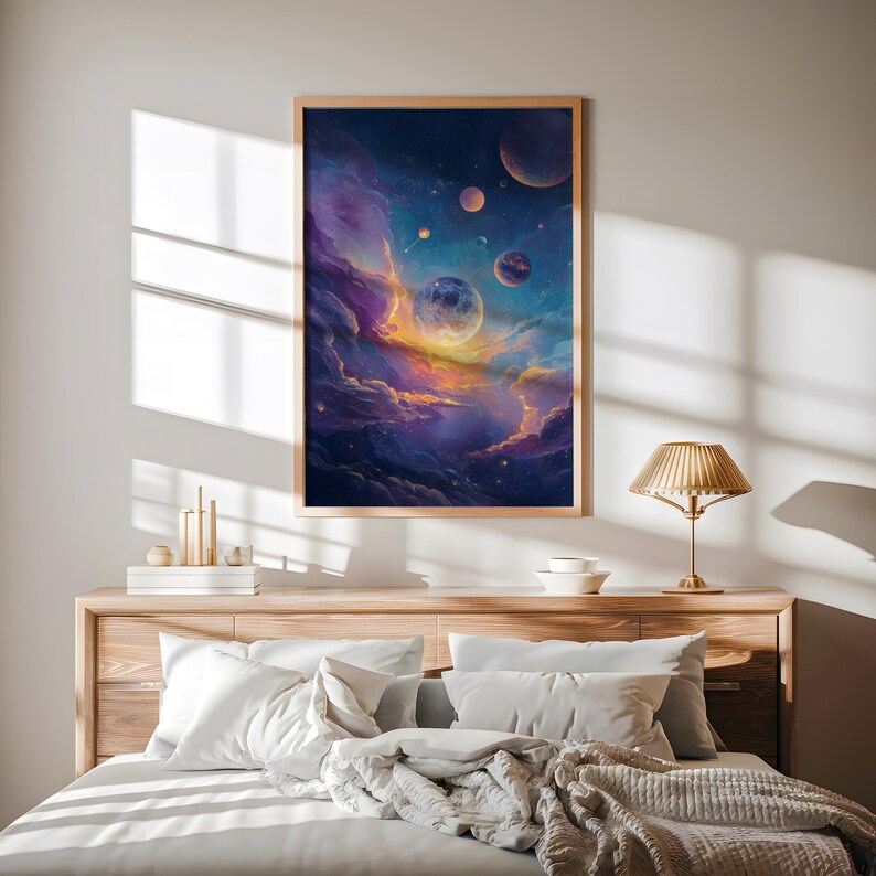 May include: A framed art print depicting a vibrant cosmic scene. The artwork features planets, nebulae, and stars in shades of blue, purple, and orange. The print is encased in a light brown wooden frame, adding a touch of warmth to the celestial display.