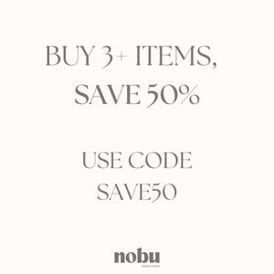 May include: A white graphic with dark grey text that reads BUY 3+ ITEMS, SAVE 50% followed by USE CODE SAVE50. At the bottom, the text nobu DESIGN STUDIO is displayed in a small, dark grey font, centred against the plain white background.