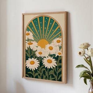 Peut inclure: Une impression d'art murale rectangulaire dans un cadre en bois clair représentant une illustration stylisée de marguerites blanches aux centres jaunes sur un fond vert foncé. Un motif de soleil arqué avec des rayons jaunes et des étoiles.