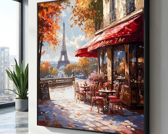May include: A framed painting depicts a Parisian cafe scene with the Eiffel Tower in the background. The cafe has a red awning and outdoor seating. Autumn foliage frames the scene, with warm colors dominating the artwork.