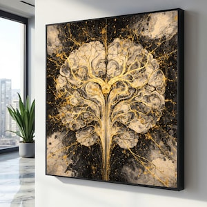 Könnte beinhalten: Abstrakter Kunstdruck mit einem gold- und cremefarbenen gehirnähnlichen Design auf schwarzem Hintergrund. Das Kunstwerk ist in einem schwarzen Rahmen gerahmt und an einer weißen Wand angebracht. Das Design hat eine baumartige Struktur mit goldenen Adern und einem Spritzer Goldfarbe.