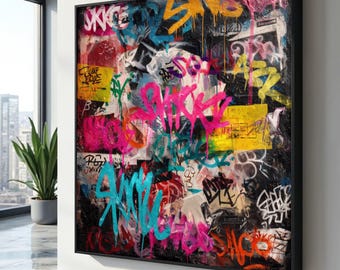 May include: A framed abstract artwork featuring a vibrant graffiti design. The artwork showcases a chaotic arrangement of colorful spray-painted words and shapes in shades of pink, blue, yellow, and orange against a black background. The frame is black.