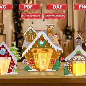 May include: A Christmas-themed display of three gingerbread house lanterns. Each house features a unique design with snow-covered roofs, candy canes, and Christmas trees. The image includes text labels: SVG, PDF, DXF, and PNG.