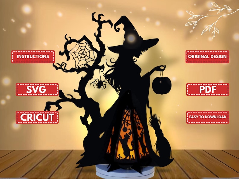 May include: A black silhouette of a witch holding a pumpkin lantern, with a tree and spiderweb design. The lantern has a cat silhouette inside. The image includes the text "INSTRUCTIONS", "SVG", "CRICUT", "ORIGINAL DESIGN", "PDF", and "EASY TO DOWNLOAD".