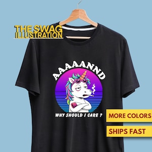 May include: Black t-shirt featuring a cartoon unicorn with sunglasses and a cigarette, set against a purple and blue sunset background. Text reads "AAAAANND" and "WHY SHOULD I CARE ?". The Swag Illustration logo is at the top.