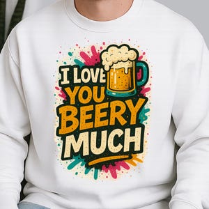 以下が含まれることがあります： 「I LOVE YOU BEERY MUCH」と書かれたカラフルなグラフィックが特徴の白いスウェットシャツ。デザインは、泡とカラフルなペイントスプラッターが付いたビールジョッキが特徴です。テキストは遊び心のある太字フォントです。
