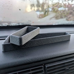 A pair of volvo 740, 940 Penntrays, pencil holder, pen tray, pennfack, myntfack, Coin compartment, Coin holder, shelf, pen, pen holder, coin