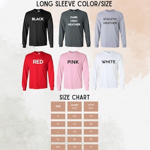 May include: Long sleeve t-shirt color and size chart. The chart shows the different colors available: black, dark gray heather, athletic heather, red, pink, and white. The chart also shows the length and width in inches for sizes S, M, L, XL, and 2XL.